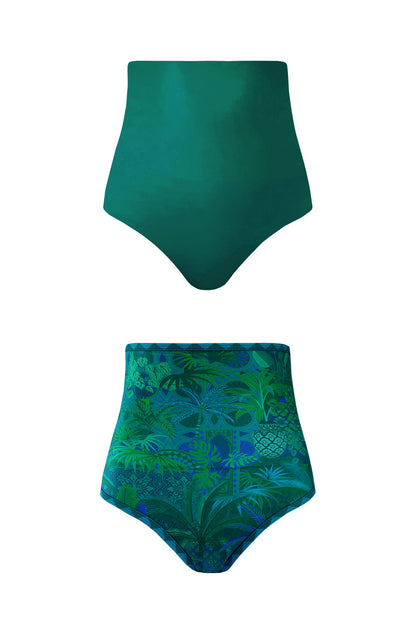 A product image displaying the high cut Brasilia bikini bottoms in each reversible side. One is solid emerald green and the other features a motif print in shades of cool green and teal.